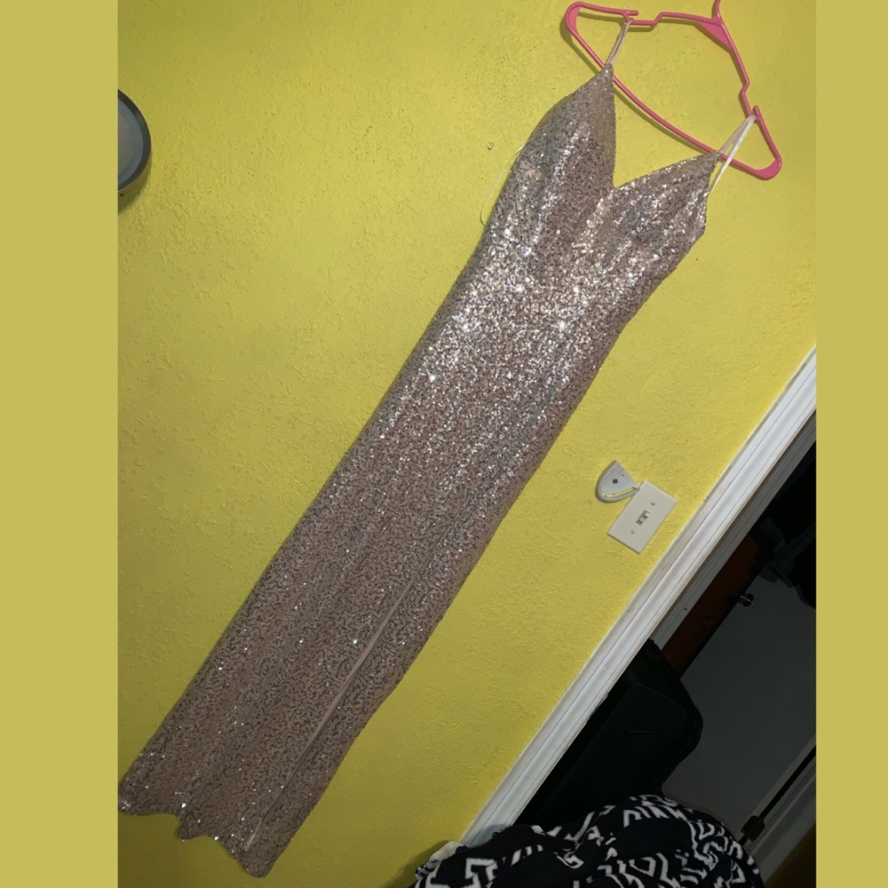 Long shiny dress.